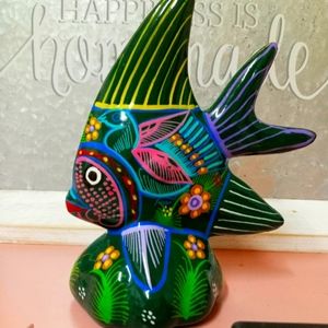 Small mexican pottery terracotta figurine made and painted by hand